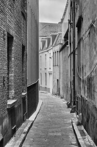 Narrow alley along buildings