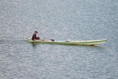 People on boat in sea