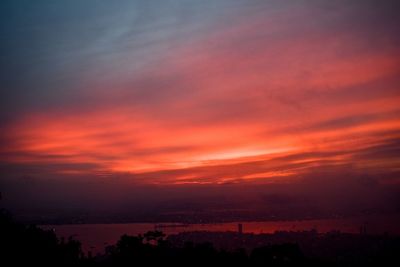 Scenic view of orange sky