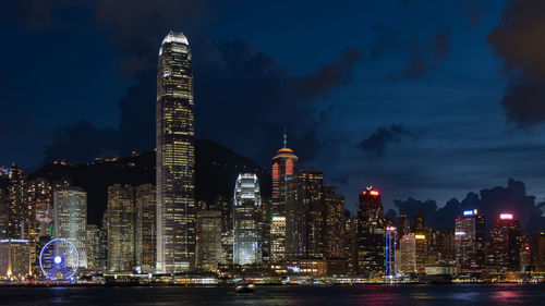 Illuminated buildings in city at night