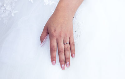 Close-up of couple holding hands