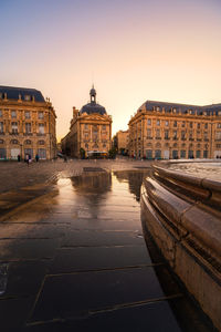 Canal amidst buildings in city