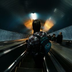 Low angle view of illuminated escalator