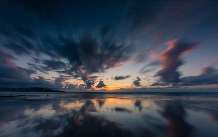 reflection, sunset, dramatic sky, cloud - sky, dusk, sky, scenics, nature, silhouette, water, no people, sea, outdoors, beauty in nature, multi colored, night, horizon over water