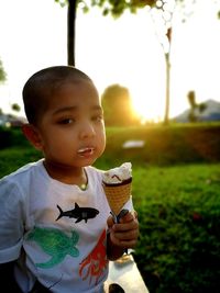 Portrait of cute boy eating ice cream