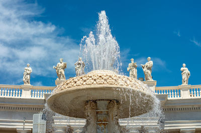 Low angle view of fountain against sky