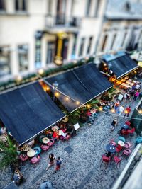 High angle view of street amidst buildings in city