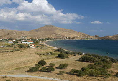 Scenic view of landscape and mountains against sky