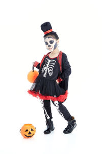 Full length of boy against sky during halloween