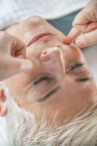 Close-up of woman getting massage at spa