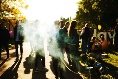 Group of people at street in city