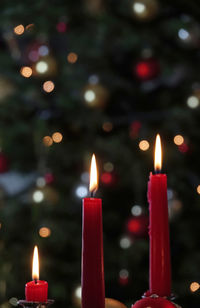 Close-up of candles burning in temple