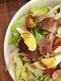 Directly above shot of salad served on table