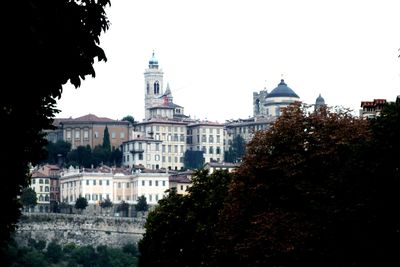 View of cityscape against clear sky