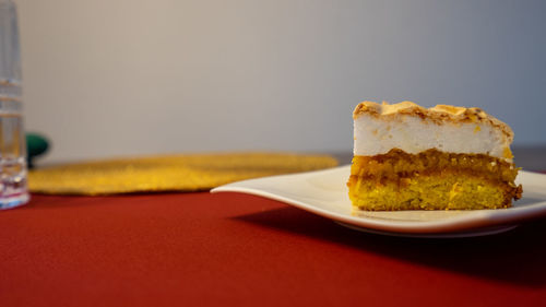 Close-up of cake in plate on table