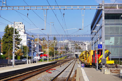 Train on railway tracks against clear sky