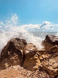 Sea waves splashing on rocks