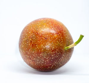 Close-up of apple against white background