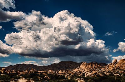 Panoramic view of landscape and mountains against sky