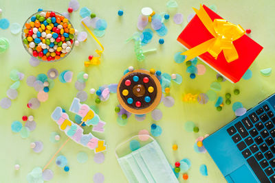 High angle view of multi colored candies on table