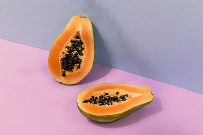 High angle view of papaya in pastel colors