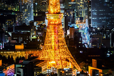 Illuminated buildings in city at night