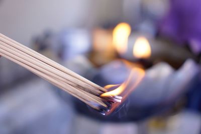 Close-up of burning incense