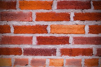 Full frame shot of red brick wall