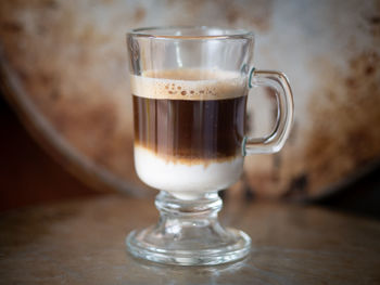 Close-up of coffee served on table