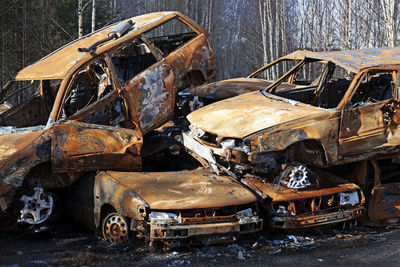 Old rusty car in park