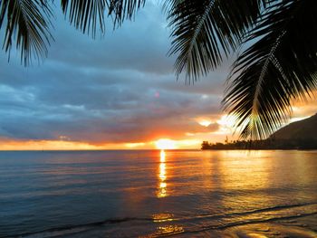 Scenic view of sea at sunset