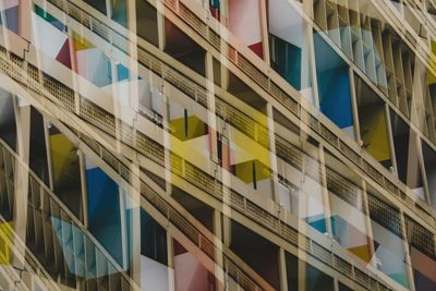 Double exposure of multi colored historic buildings