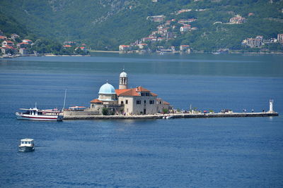 Kotor bay are a series of coves on the southern dalmatian coast of the adriatic sea in montenegro