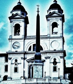 Low angle view of church against blue sky