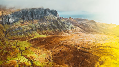 Scenic view of rock formations against sky