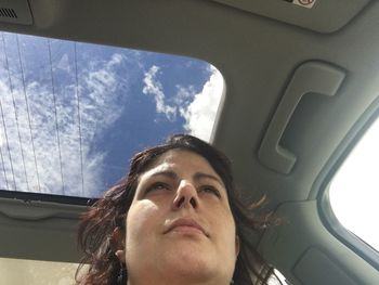 Portrait of a woman in car