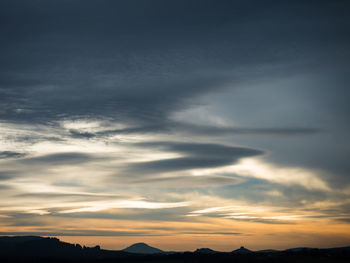 Low angle view of dramatic sky during sunset