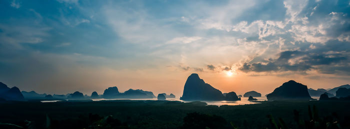 Scenic view of mountains against sky during sunset