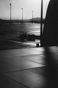 Empty airport runway against sky