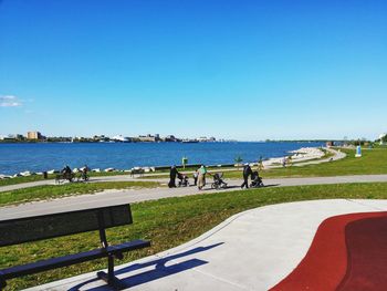 Scenic view of calm sea against clear blue sky