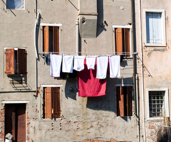 Low angle view of clothes drying on wall