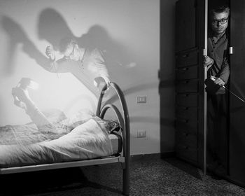 Low section of men on bed