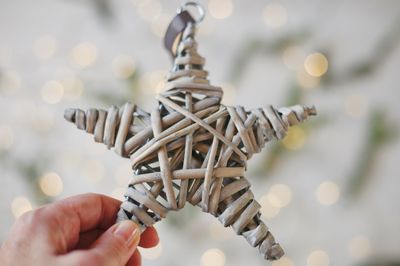 Close-up of person holding umbrella