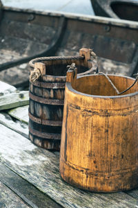 Close-up of old water barrels