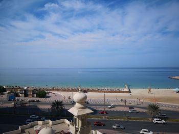 High angle view of beach and buildings against sky