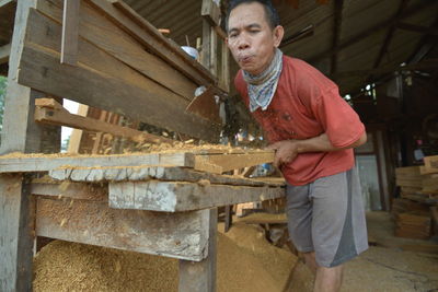 Carpenter working at workshop