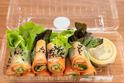 High angle view of various vegetables in plate on table