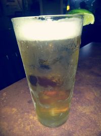 Close-up of beer in glass on table