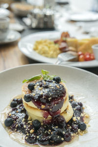 Close-up of breakfast served on table