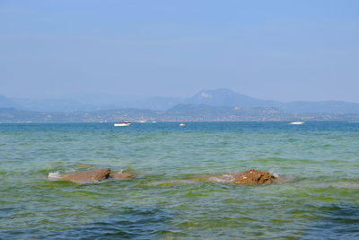 Scenic view of sea against clear sky